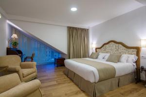 Posteľ alebo postele v izbe v ubytovaní Suite Home Sardinero
