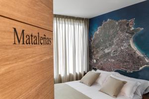 Posteľ alebo postele v izbe v ubytovaní Suite Home Sardinero