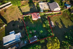 an aerial view of a yard with a house at Villa Marie in Nosy Be
