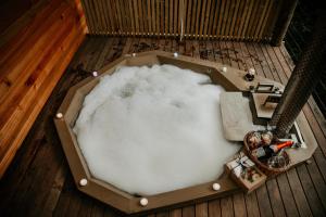 a box filled with snow on a deck at The Cabins Hogsback in Hogsback +122 photos