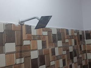 a street light on the side of a building at Royal Orbit By StayApart in Sonprayag