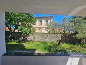 a view of a house from a window of a yard at N'Shkoder in Shkodër