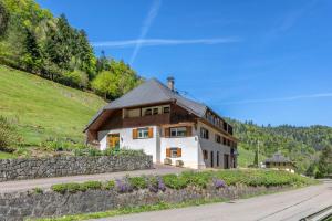 a house on the side of a hill at Ferienwohnung Belchenzeit in Münstertal