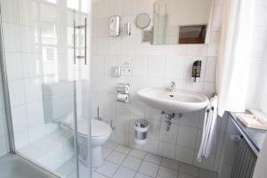 Ein Badezimmer in der Unterkunft Stadthotel Jülich