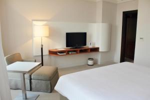 Телевизор и/или развлекательный центр в K108 Hotel Doha