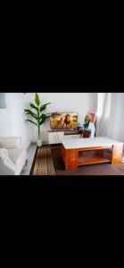 a living room with a couch and a coffee table at Malindi Leisure homes in Malindi