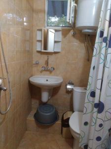 Koupelna v ubytování Nimpha Bungalows + 37 fotografií