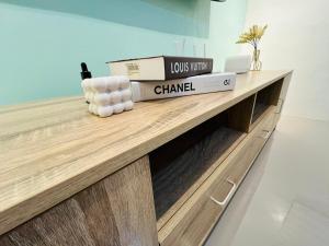 a wooden counter with boxes on top of it at Casa Serenity Transient House in General Trias