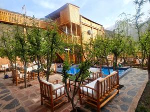 a group of chairs sitting in front of a pool at Afla views in Imlil