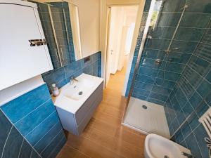 a bathroom with a sink and a shower and a toilet at Noli Blue Bay in Noli +27 photos
