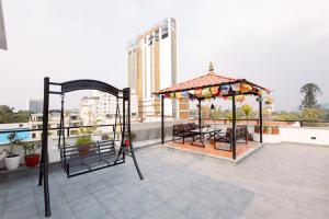 a gazebo on the roof of a building at Tulsi Kathmandu Hotel in Kathmandu