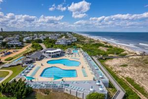 an aerial view of a resort with a beach at Heron Landing in Corolla +73 photos