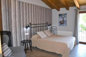 Postel nebo postele na pokoji v ubytování Casa Carlota