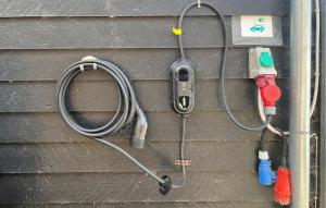 a hose is hooked up to a house at Three-Bedroom Holiday Home In Bogense in Bogense