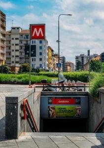 a tv sitting on a wall in a city at Hotel Emmy in Milan