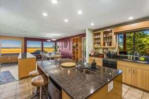 a kitchen with a sink and a counter at Spacious Gracious & Luxurious Retreat in Westport