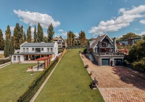 an aerial view of a house with a yard at The Red Door in Clarens