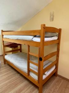 a couple of bunk beds in a room at Appartement en bord de lac in Malbuisson