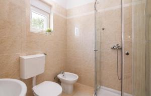 a bathroom with a toilet and a shower at Apartman Ivana in Kruševo