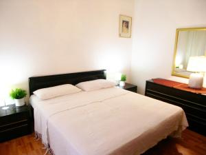 
Letto o letti in una camera di San Marco Appartament
