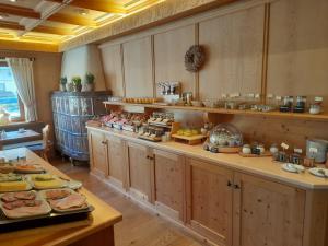 a buffet line with many different types of food at Hotel Seerose in Rottach-Egern