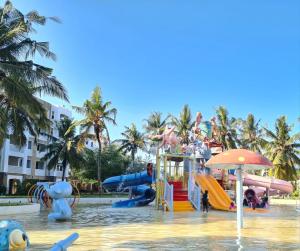 a water park with a bunch of water slides at WakaWaka SeaView Beach Condo in Mombasa +5 photos