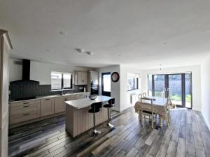 a kitchen with a counter and a table in it at Parochial View in Athboy