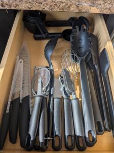 a drawer filled with different types of kitchen utensils at 2-bedroom house close to Marathon in Robinson