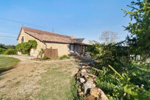 an external view of a house with a yard at Les Orchidées - Chambre in Savignac-de-Miremont +19 photos
