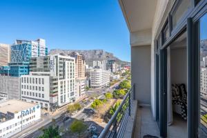 a balcony with a view of a city at Built on Hope De Waterkant in Cape Town