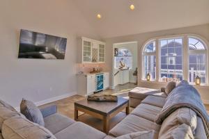 a living room with a couch and a table at The Royal Treat in Lavallette