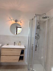 a bathroom with a shower and a sink and a mirror at Agriturismo Casa Paradiso in Cortona +19 photos