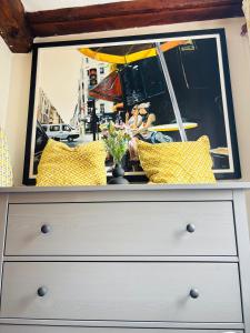 a dresser with a mirror on top of it at Agniti Cottage in Derby +28 photos