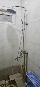 a bathroom with a shower in a wall at Corps-A in Almaty +51 photos