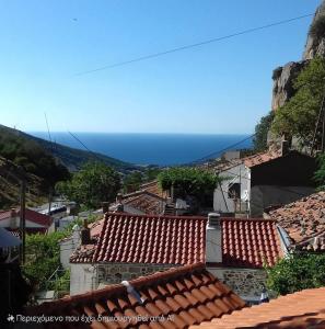 a view of the ocean from the roofs of houses at Castle View in Samothraki