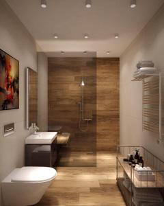 a bathroom with a toilet and a sink and a shower at TutiFuti Casa in Chuy