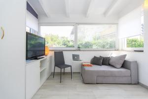 TV a/nebo společenská místnost v ubytování Apartments Aida