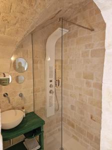 a bathroom with a shower and a sink at Stanza29 in Martina Franca