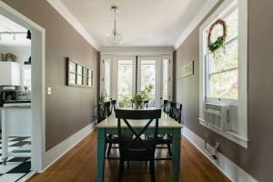 a kitchen with a table and chairs in a room at Iconic Modern Farmhouse in San Luis Obispo
