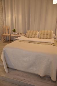 Postel nebo postele na pokoji v ubytování Apartment Into3City Old Town Gdansk