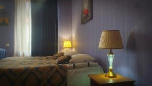 En eller flere senge i et værelse på Horizon inn
