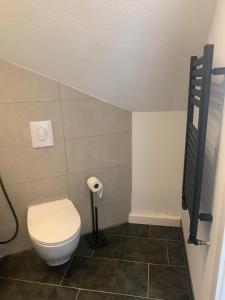 Bany a Helles Dachzimmer