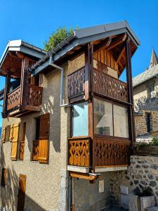 a balcony on the side of a building at Villa Silote in La Grave