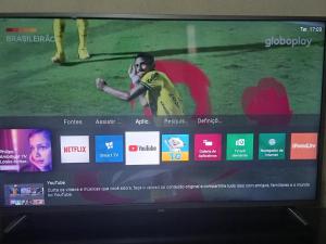 a television screen with a video of a soccer game at Casa 2 quartos perto Centro Ipatinga e aeroporto in Santana do Paraíso