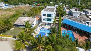 an aerial view of a resort with a swimming pool at Blue Apartahotel Coveñas in Coveñas