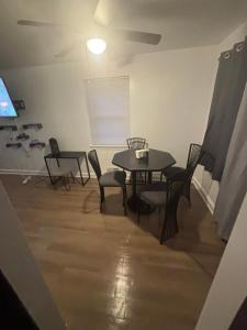a dining room with a table and chairs at Peace & Relax sensation in Washington, D.C.