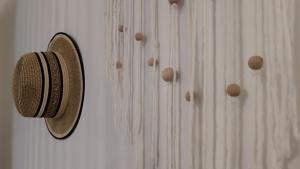 a microphone hanging on a wall next to wooden doors at Liège City break in Liège +46 photos