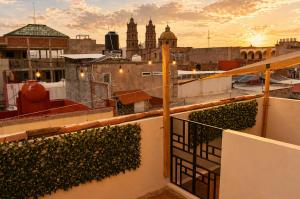 a view of the city from the roof of a building at El Suburbio - Serapio Rendon in Morelia