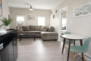 a living room with a couch and a table at Gateway Getaways in Hagerstown