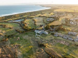 an aerial view of a resort next to the ocean at 13th Beach Golf Lodges in Barwon Heads